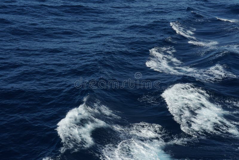 Sea wave on the Mediterranean Sea. There is splashed water on the crest of waves. royalty free stock image