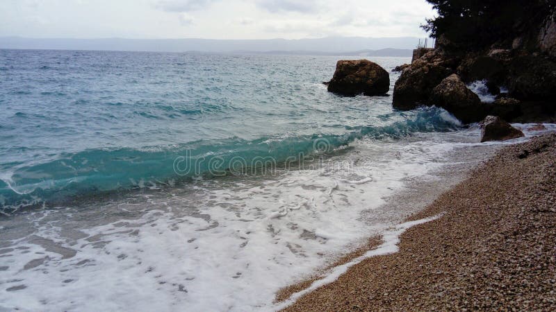 Sea waves on tropical beach in natural harmony. Sea waves on tropical beach in natural harmony.