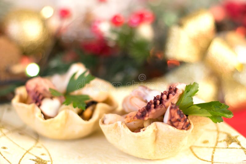 Seafood Appetizer Inside Bread Basket on Christmas Table Stock Image