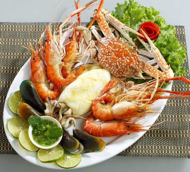 Mix seafood dish isolated stock image. Image of crab 19744961