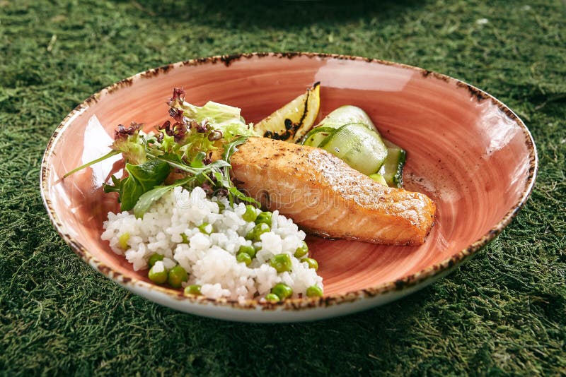 Seafood Dishes with Salmon Steak and Rice Stock Photo - Image of