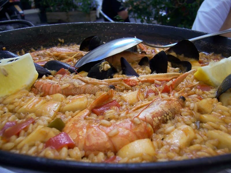 Large frying pan with rice and seafood in a street cafe, Stock Photo,  Picture And Rights Managed Image. Pic. ZON-15882810