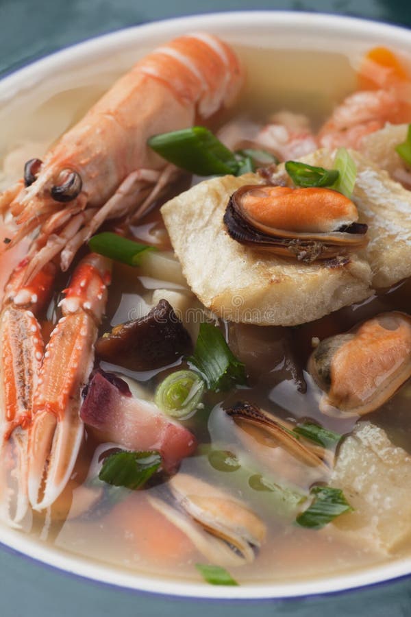 Seafood and vegetable soup stock image. Image of meal 36917845