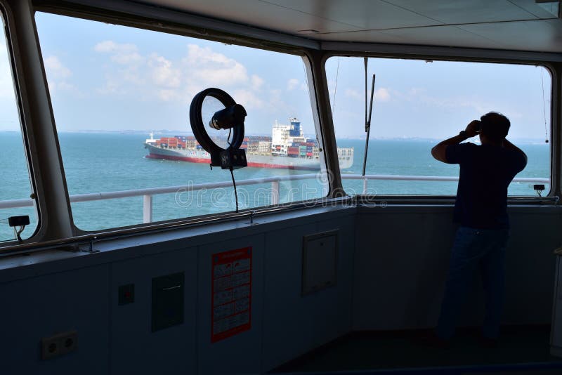 Seaman on the Watch, Looking at the Container Vessel Passing Editorial Photography - Image of monitoring, maritime: 123800797 Seaman on the Watch, Looking at the Container Vessel Passing Editorial Photography - Image of monitoring, maritime: 123800797