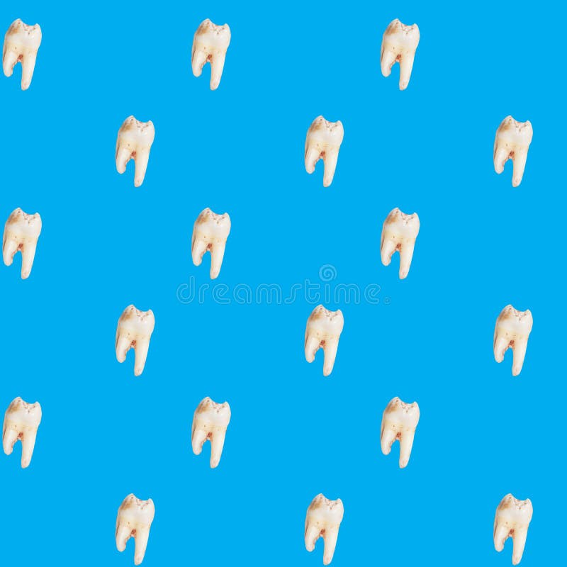 Seamless background with real torn teeth on blue color