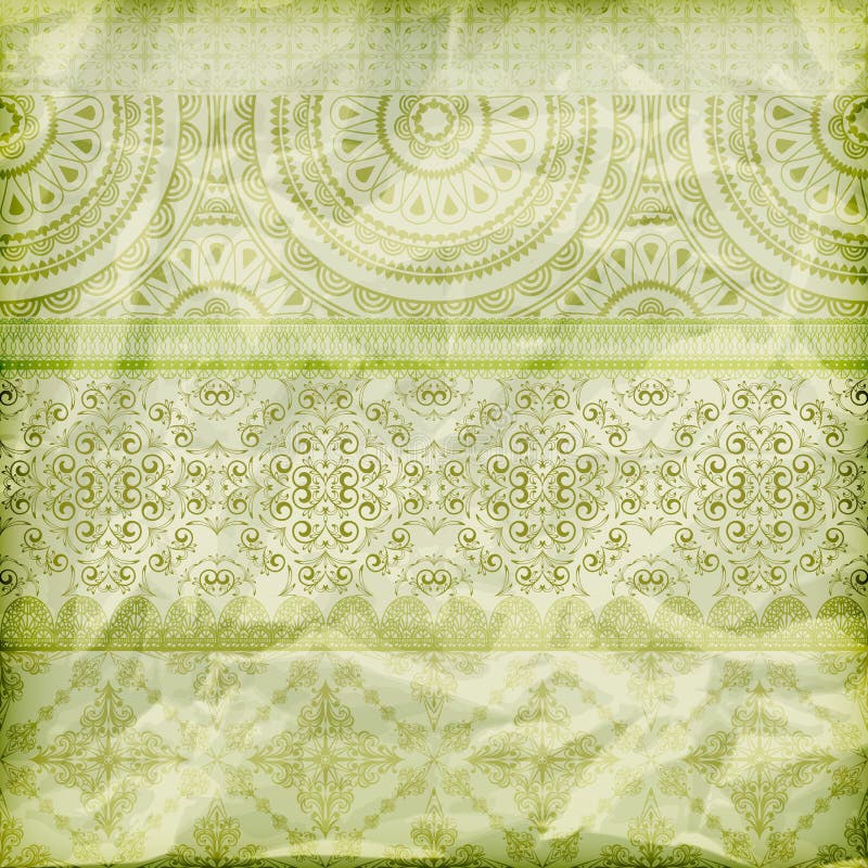 seamless floral borders on crumpled green foil paper texture. seamless floral borders on crumpled green foil paper texture