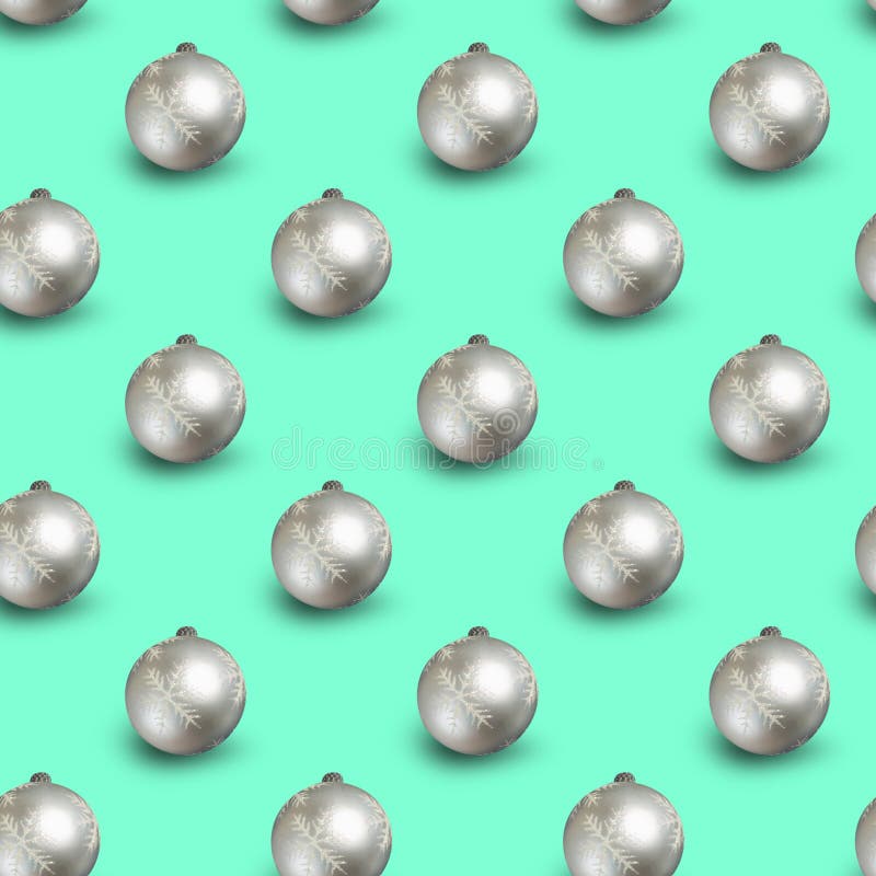 Seamless Christmas Pattern with Shiny Silver Balls on Mint Background