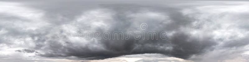 Seamless cloudy dark sky before storm hdri panorama 360 degrees angle view with beautiful clouds  with zenith for use in 3d