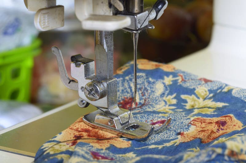 Seamstress Hands Sew on a Sewing Machine. Needle Bar, Presser Foot