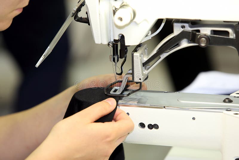 Seamstress Sews Material on the Sewing Machine Stock Image Image of