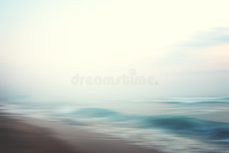 A seascape abstract beach background. panning motion blur with a long exposure, pastel colors in a vintage and retro style.