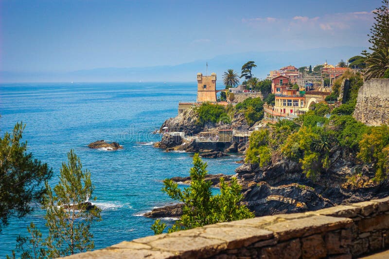 Seascape with the Mediterranean rocky coastline and promenade at Genoa Nervi
