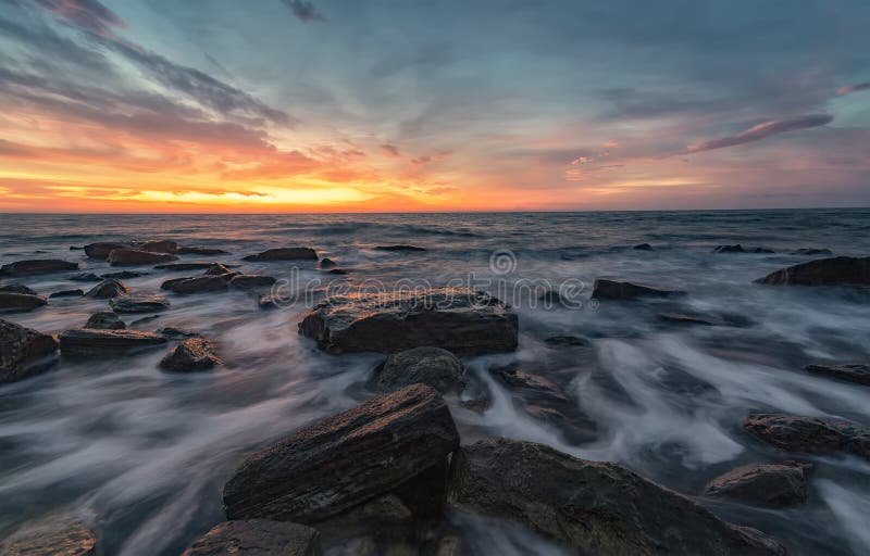 Stunning natural seascape. Sea sunrise at the Black Sea coast stock photos Stunning natural seascape. Sea sunrise at the Black Sea coast stock photos