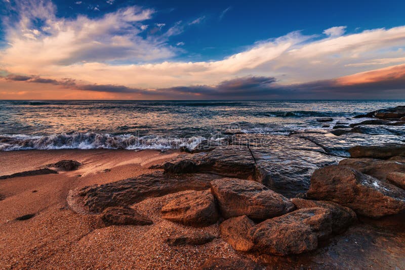 Seashore with cliffs, waves crashing on rocks stock photos Seashore with cliffs, waves crashing on rocks stock photos