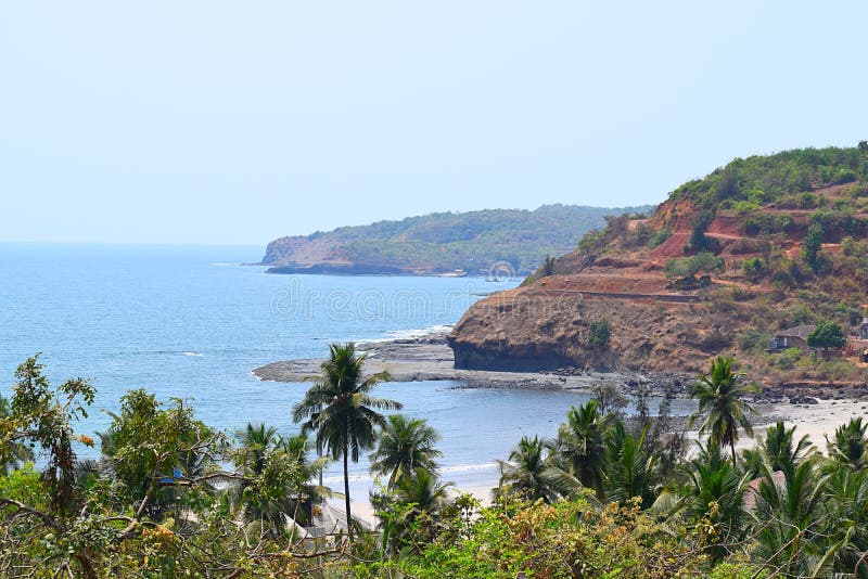 Seaside of Arabian sea with Hills and Palm Trees, Velaneshwar Beach, Ratnagiri, Maharashtra, India - A Natural Background royalty free stock images Seaside of Arabian sea with Hills and Palm Trees, Velaneshwar Beach, Ratnagiri, Maharashtra, India - A Natural Background royalty free stock images