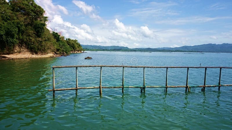 Seaside ocean shore bamboo nets for fish royalty free stock photo Seaside ocean shore bamboo nets for fish royalty free stock photo
