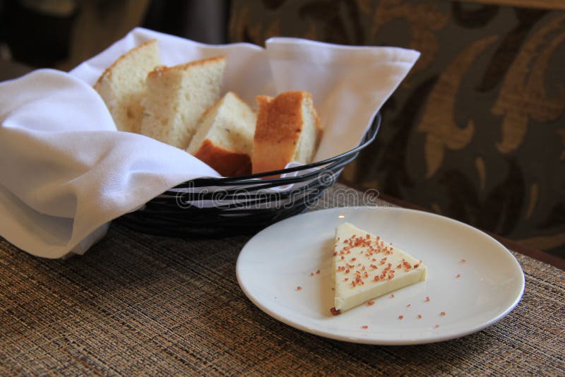 Seasoned butter and fresh baked focaccia bread royalty free stock image Seasoned butter and fresh baked focaccia bread royalty free stock image