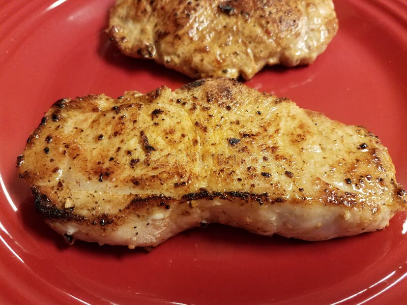 Seasoned and Fried Pork Chops on Red Plate Stock Image Image of juicy