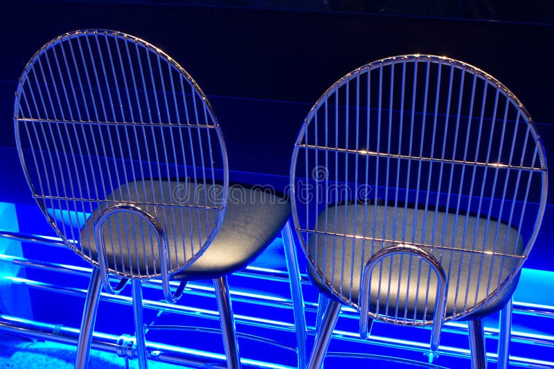 Seats with blue neon glow