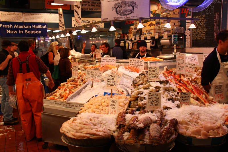 A sample of the seafood offerings at a vendor in the Pike Place Public Market, overlooking Puget Sound in downtown Seattle, Washington. Pike Place is one of the oldest public markets in the United States, having been in operation since 1907. Fish, produce and crafts of all sorts can be found at the market. With over 10 million visitors annually, it is hugely popular with both local residents and tourists from all over the world, and has been featured in numerous documentaries and television specials. Seattle is the business and tourism hub of the Northwestern corner of the United States and is home to the corporate headquarters of Microsoft, Boeing and Starbucks among others. A sample of the seafood offerings at a vendor in the Pike Place Public Market, overlooking Puget Sound in downtown Seattle, Washington. Pike Place is one of the oldest public markets in the United States, having been in operation since 1907. Fish, produce and crafts of all sorts can be found at the market. With over 10 million visitors annually, it is hugely popular with both local residents and tourists from all over the world, and has been featured in numerous documentaries and television specials. Seattle is the business and tourism hub of the Northwestern corner of the United States and is home to the corporate headquarters of Microsoft, Boeing and Starbucks among others.