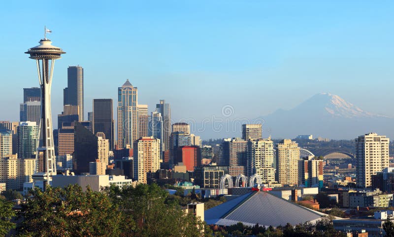 Seattle skyline panorama at sunset & Mt. Rainier.