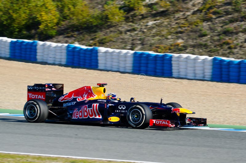 Sebastian Vettel di Red Bull che corre squadra immagini stock Sebastian Vettel di Red Bull che corre squadra immagini stock