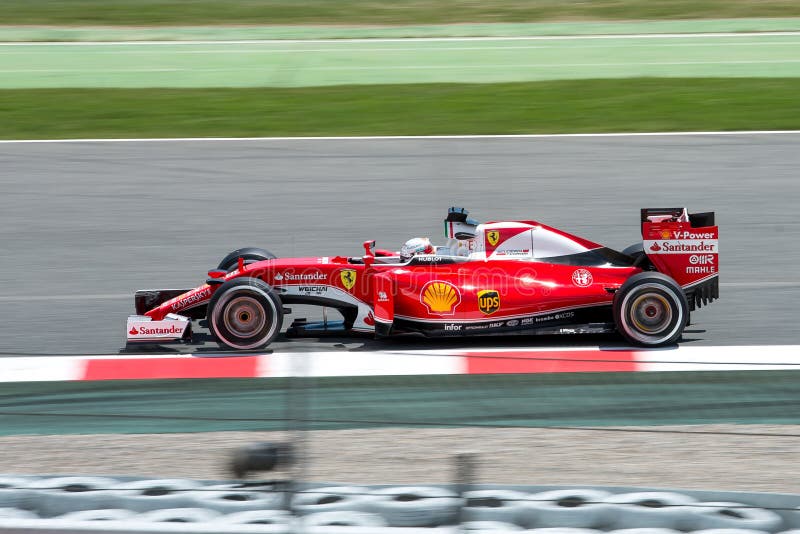 Sebastian Vettel управляет автомобилем Scuderia Феррари на следе для испанского Формула-1 Grand Prix на Цепи de Catalunya стоковое изображение rf Sebastian Vettel управляет автомобилем Scuderia Феррари на следе для испанского Формула-1 Grand Prix на Цепи de Catalunya стоковое изображение rf