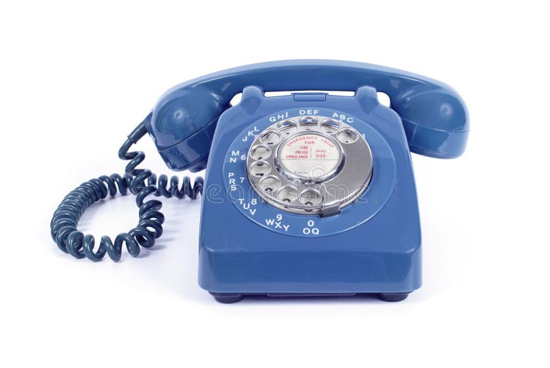 Classic British vintage rotary dial blue telephone  from the 1960s on white background. Classic British vintage rotary dial blue telephone  from the 1960s on white background