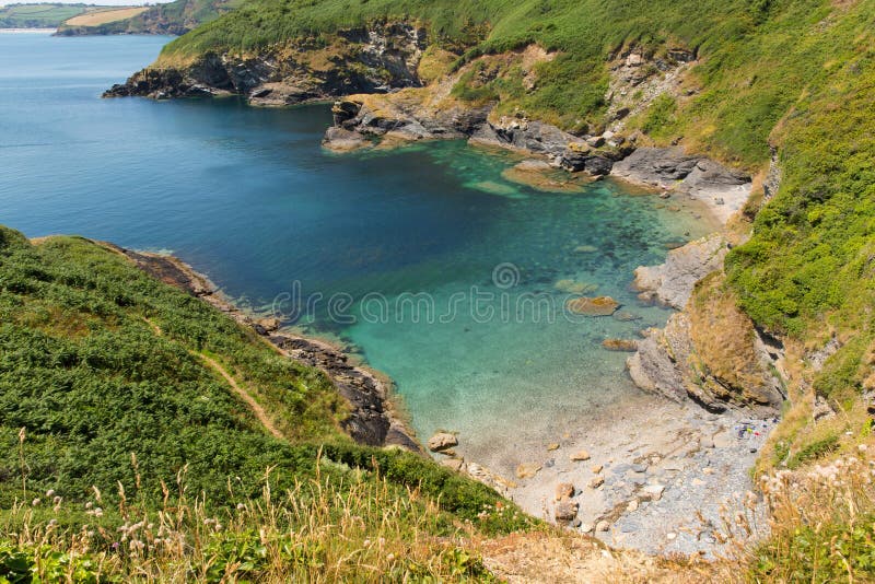 Secluded beach and cove turquoise sea Cornw