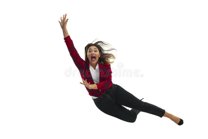 A second before falling - young girl falling down with bright emotions and expression