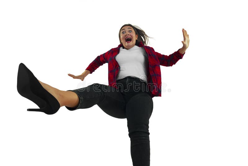 A second before falling - young girl falling down with bright emotions and expression