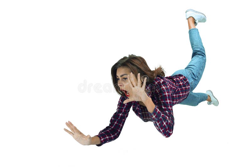 A second before falling - young girl falling down with bright emotions and expression royalty free stock photos A second before falling - young girl falling down with bright emotions and expression royalty free stock photos