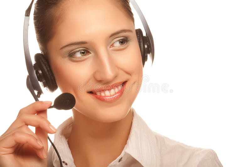 Portrait of friendly secretary/telephone operator wearing headset. Portrait of friendly secretary/telephone operator wearing headset