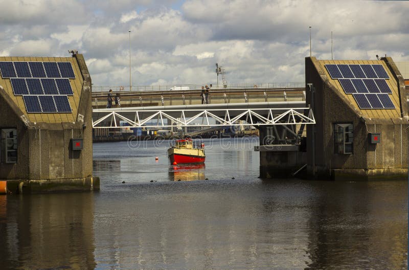 A section of the flood barrier and footbridge over the River Lagan in the harbour estate in Belfast Northern Ireland