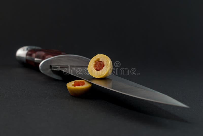 Green Olive Filled Red Pepper Knife Blade Black Background Stock Photos