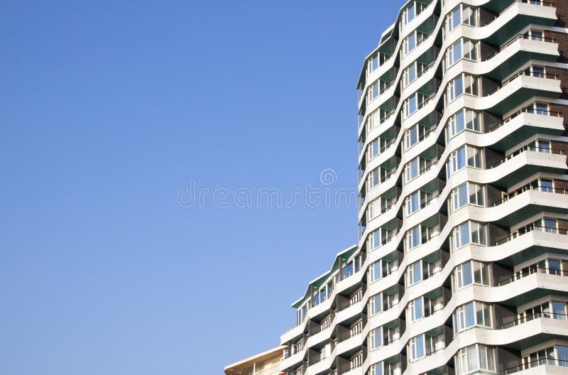 Section of High Rise Apartments Against Blue Sky royalty free stock photography