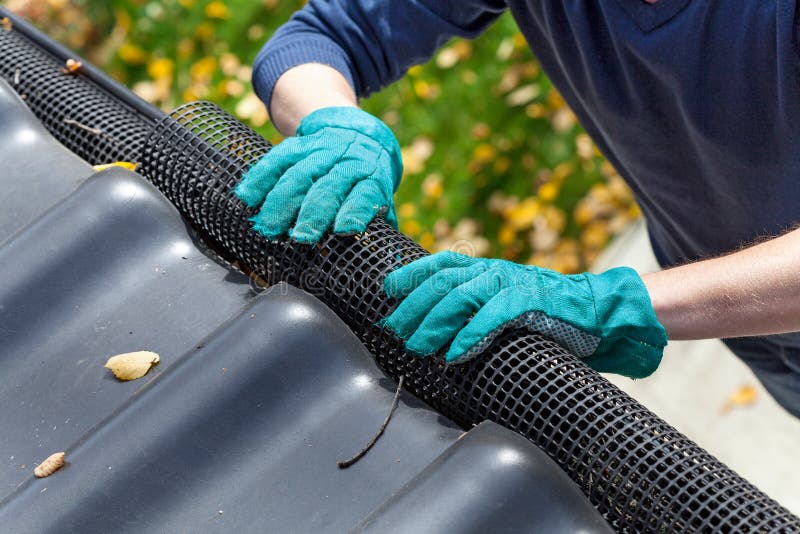 Securing gutters stock photos