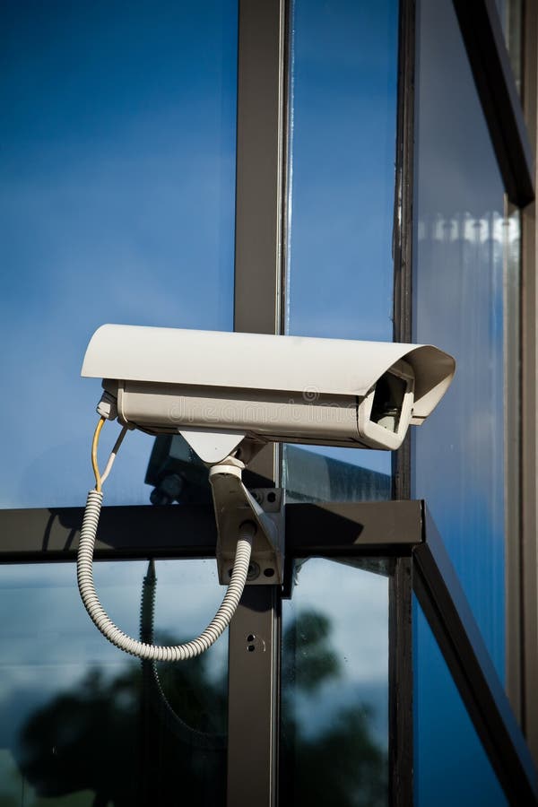 Security camera attached on building stock photography Security camera attached on building stock photography