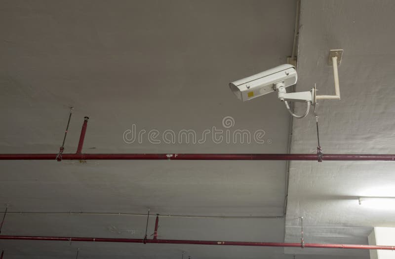 Security Camera, CCTV Camera in Car Park Building. Stock Image Image