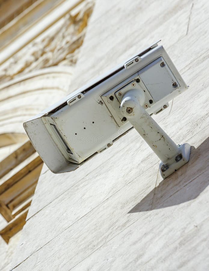 Security CCTV camera or surveillance system fixed on old construction wall. Old cctv monitor stock images, royalty-free photos and pictures