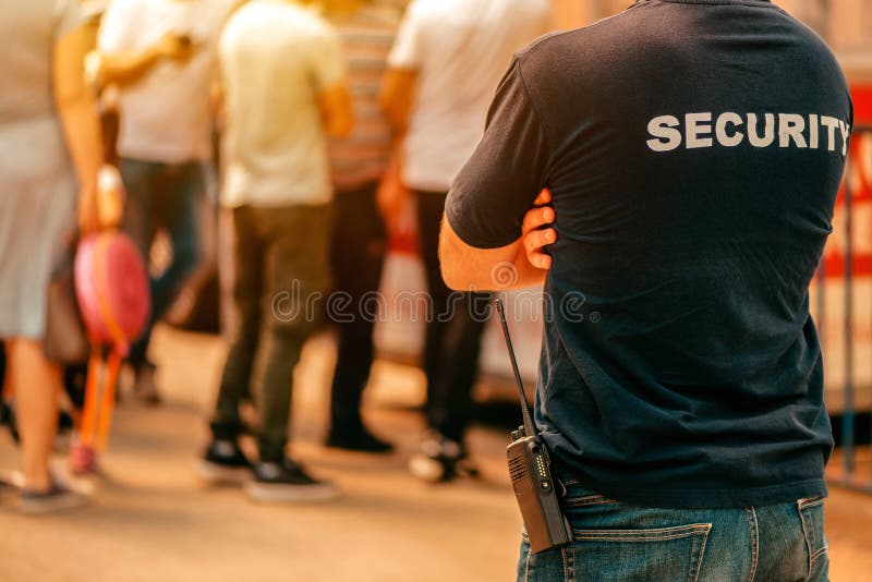 Security guard at live festivale event royalty free stock photo