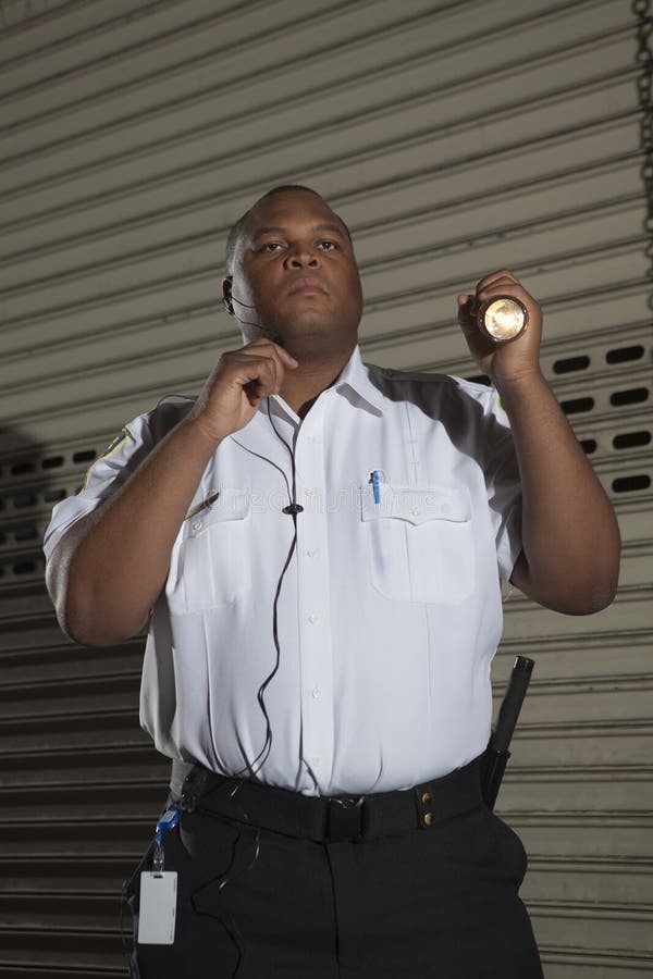 Security Guard Patrols at Night Stock Photo Image of islander, person