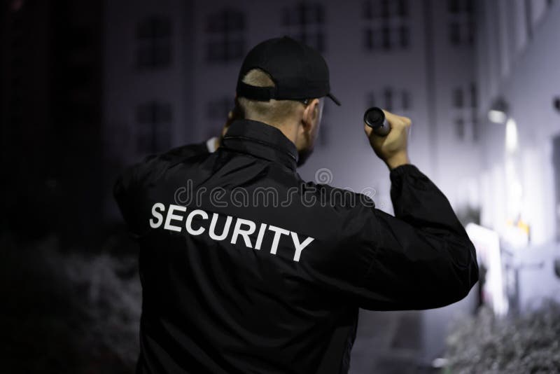 Security Guard Walking Building Perimeter