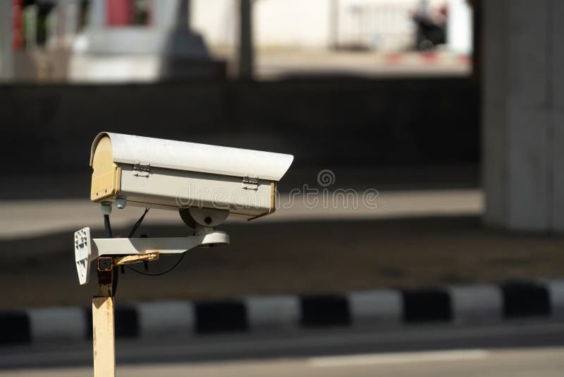Security monitoring CCTV camera mounted on old pole steel post. Old cctv monitor stock images, royalty-free photos and pictures