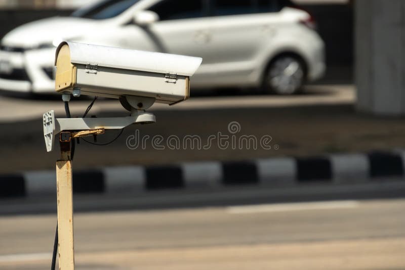 Security monitoring CCTV camera mounted on old pole steel post. Old cctv monitor stock images, royalty-free photos and pictures