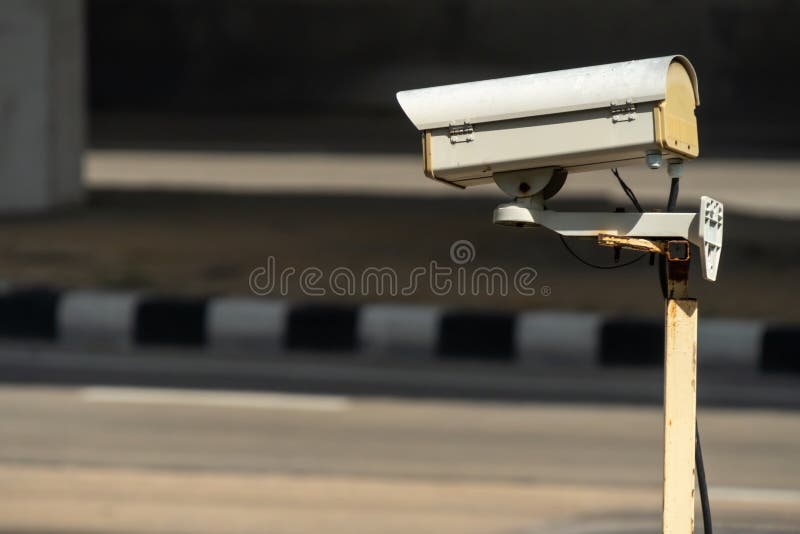 Security monitoring CCTV camera mounted on old pole steel post. Old cctv monitor stock images, royalty-free photos and pictures