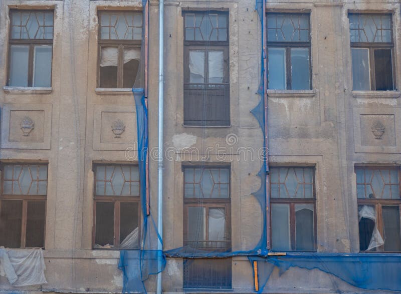 Security net on a demolition house stock photo