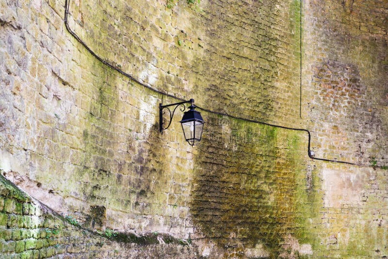 old lantern on inner wall of Chateau de Sedan royalty free stock photos old lantern on inner wall of Chateau de Sedan royalty free stock photos