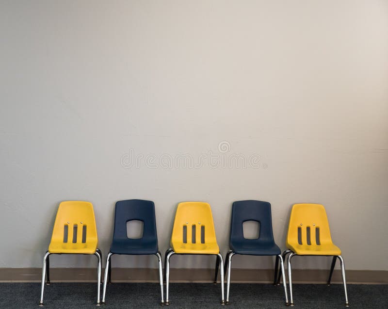 5 children's chairs near the wall. 5 children's chairs near the wall