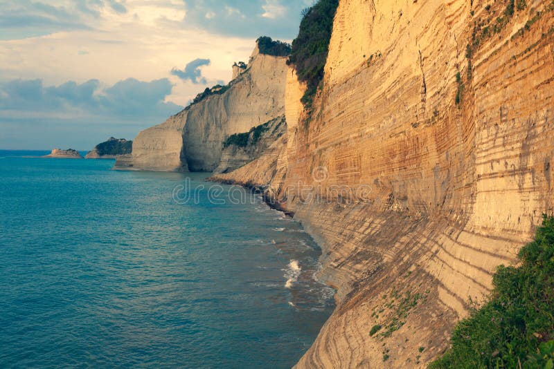 Sedimentary Rock Cliff at the sea, Limestone Natural Structure Coast, Mointain Chain of Layered Stone Formation along the Beach, H